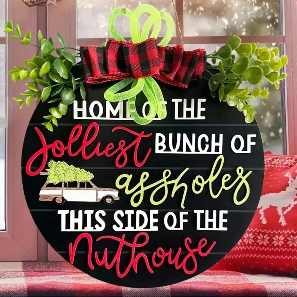Home of the Jolliest Bunch of Assholes This Side of The Nuthouse wooden sign